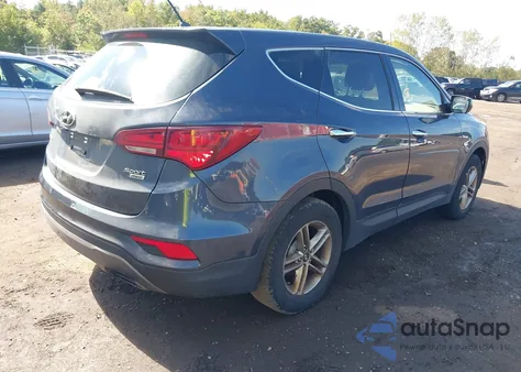 2018 Hyundai Santa Fe Sport 2.4L z USA, uszkodzony, nr VIN 5NMZTDLB9JH071864